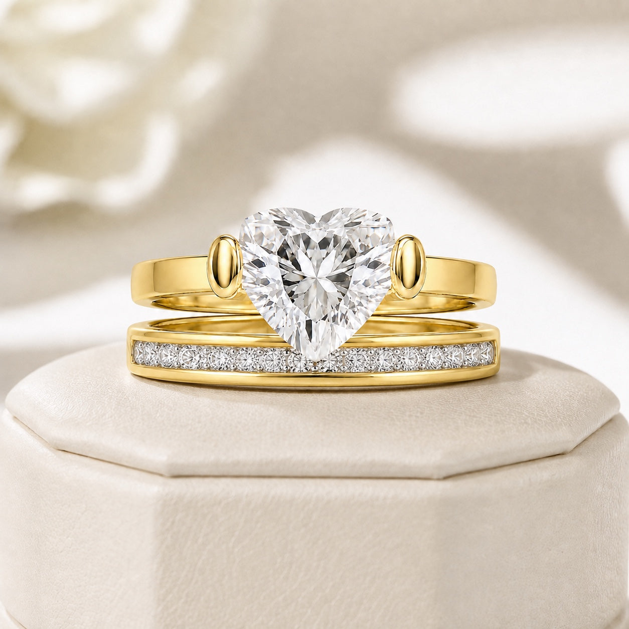 Aurelia Lumina Duo Ring Set on a cream jewellery display