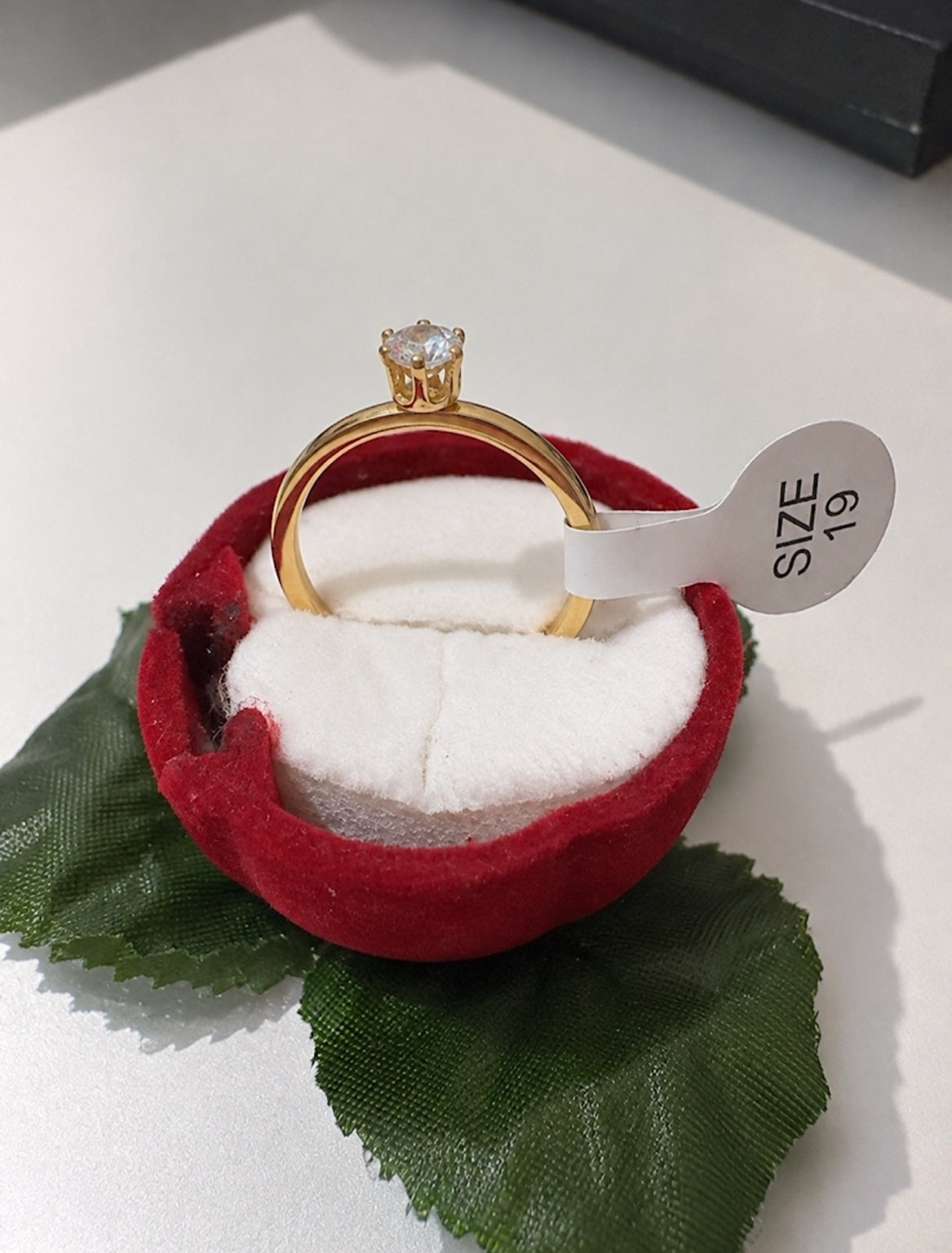 Luce Solitaire Ring in red presentation box