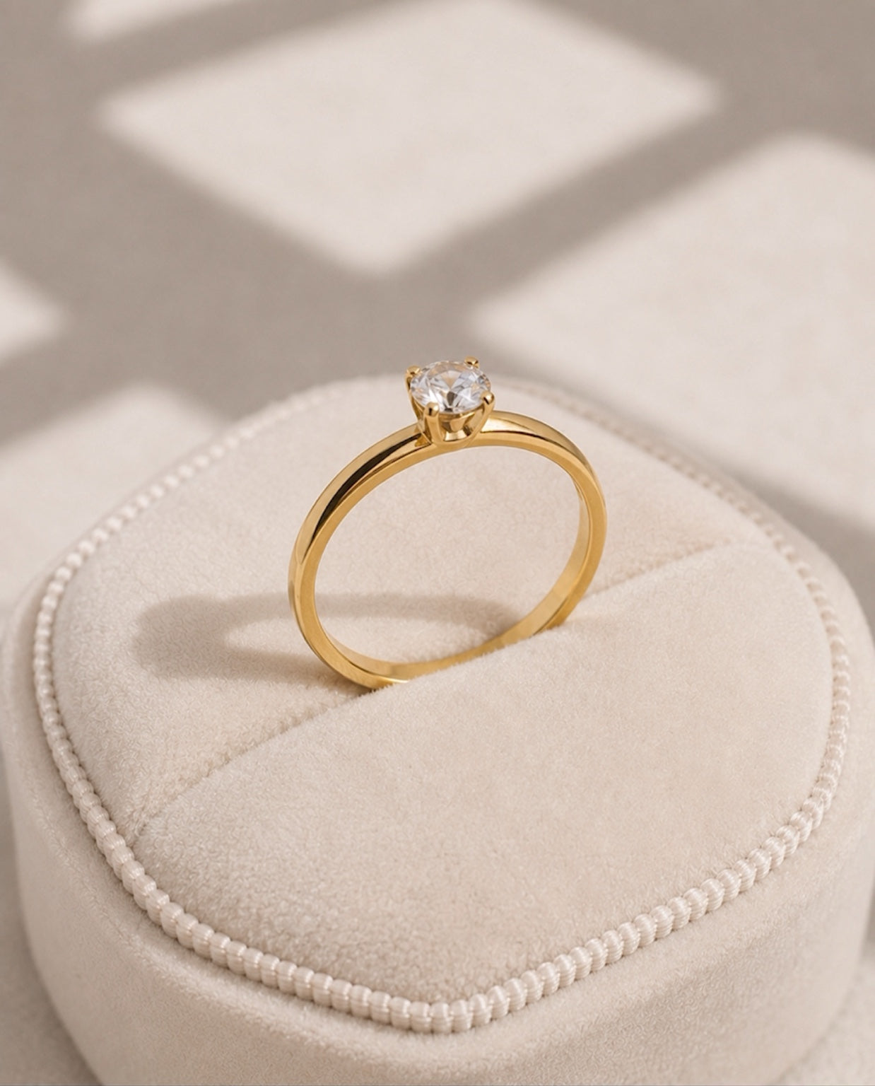Luce Solitaire Ring on jewellery display