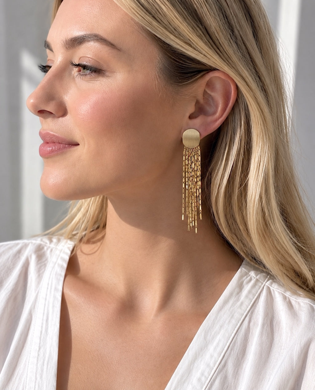 Sera Tassel Earrings worn by model