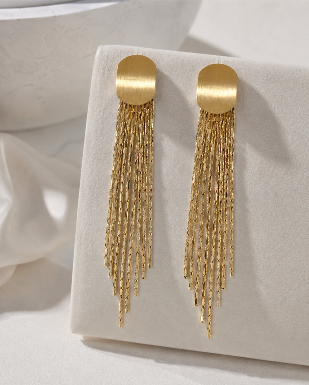 Sera Tassel Earrings on display