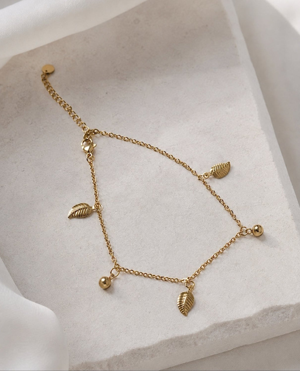 Sylva Leaf Charm Anklet on display